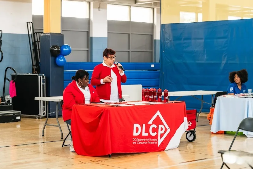 Presenters sharing information at a community resource event